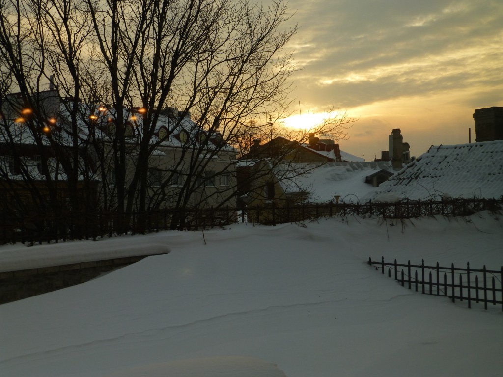 View from the apartment window at sunset at 15:20 in the afternoon.